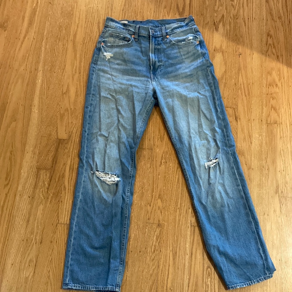 Dark wash, loose high rise jeans (small knee rips)